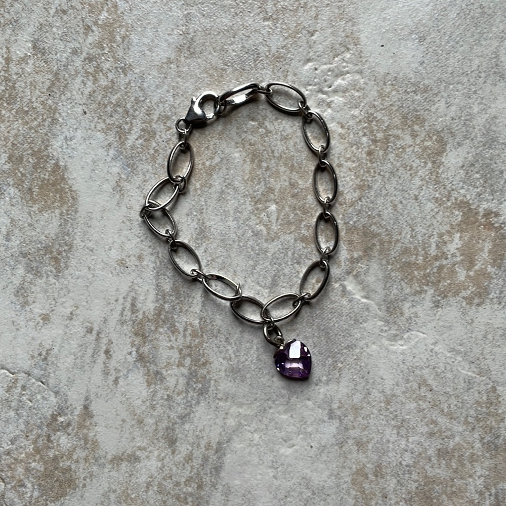 Silver bracelet with amethyst charm